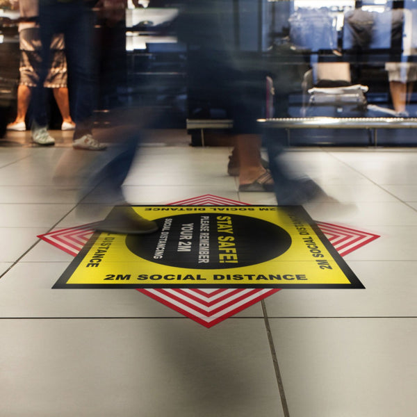vinyl floor sticker promoting to social distance at 2m